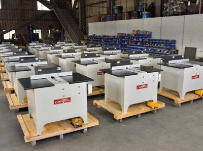 Image of Cantek Notchers lined up in the warehouse ready for shipping